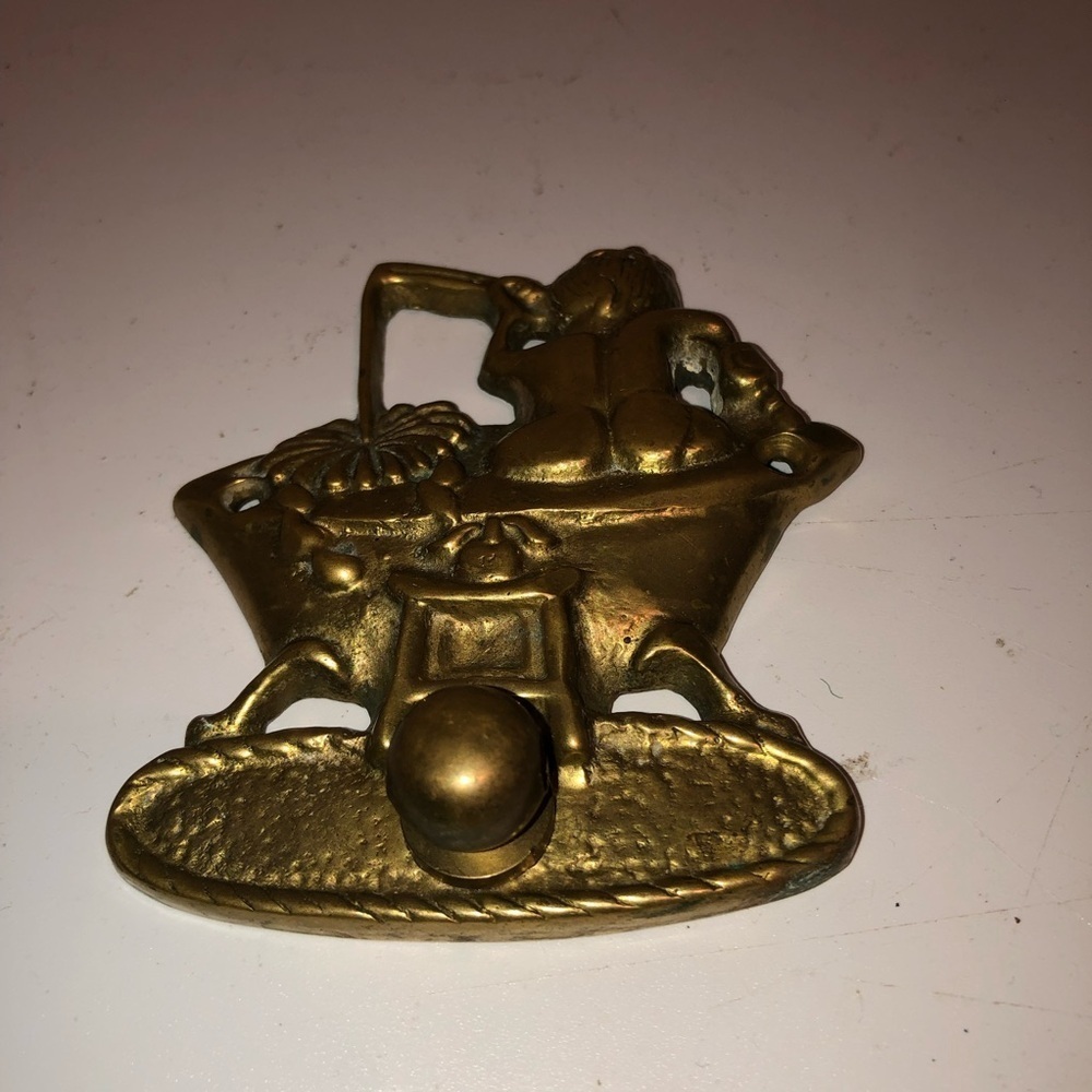 Vintage brass hook with boy fishing in a claw tub bath- 4” by 3” - preloved.
